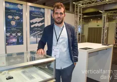 Dario Piermatteo with Khatod showcasing optical components that help with energy saving as their lights equally distribute the light to crops