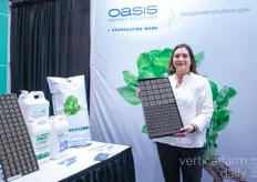 Mary Bruns with Smithers-Oasis holding the Horticubes AeroMAX