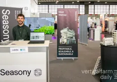 Dan Nielsen with Seasony proudly showing of their latest Watny robot for vertical farms