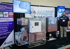 Dominic Paulhus with Mabre Air Systems shows the air handling systems of the company